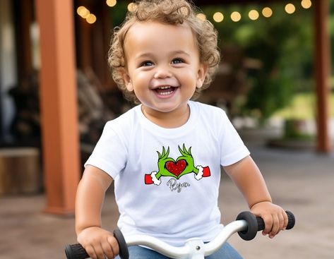 Personalized Grinch Heart Hands Toddler Short Sleeve Tee|Grinch Toddler Tees|Christmas ToddlerTees|Grinch|Personalized Grinch Tees Baby Christmas Shirt, Grinch Heart, Toddler Christmas Shirt, Grinch Shirt, Grinch Shirts, Christmas Pajamas Kids, Christmas Shirts For Kids, Diy Toddler, Christmas Tree Shirt