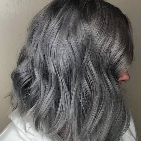 What You Need To Know About The Smoky Hair Color Trend | Hair.com By L'Oréal Charcoal Grey Hair, Dark Grey Hair Color, Dark Silver Hair, Metallic Hair Color, Ash Gray Hair Color, Ash Grey Hair, Charcoal Hair, Silver Ombre Hair, Blue Grey Hair