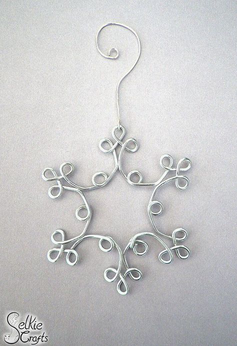 Silver & Blue Snowflake Christmas Decorations | Wire ornaments, Beaded christmas decorations, Handmade christmas decorations Wire Snowflake, Christmas Decorations Handmade, Wire Jig, Art Fil, Copper Wire Art, Wire Ornaments, Wire Jewelery, Wire Wrap Jewelry Designs, Wire Wrapped Jewelry Diy