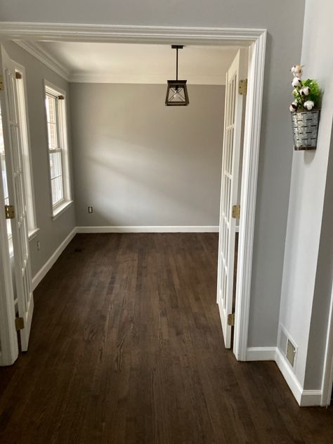 Hardwood Floors Trim Paint Walnut Floor White Walls, Light Gray Walls Dark Floors, Original Hardwood Floor Stain Colors, Dark Flooring White Walls, Dark Wood Floors White Trim, Dark Wood Floor Beige Walls, Gray Walls With Dark Wood Floors, Dark Floors Gray Walls, Gray Wall Wood Floor