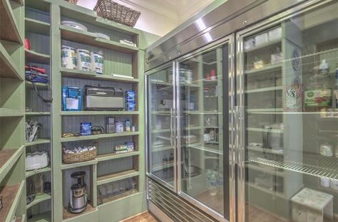 This walk-in pantry is made more functional by the inclusion of a huge refrigerator. Both non-refrigerated and refrigerated foods are conveniently kept here. It's big enough to hold some kitchen appliances, too. Pantry With Fridge, Dream Pantry, Pantry Inspiration, Pantry Room, Butler’s Pantry, Outdoor Kitchen Appliances, Fabulous Kitchens, Kitchen Pantry Design, Butler's Pantry