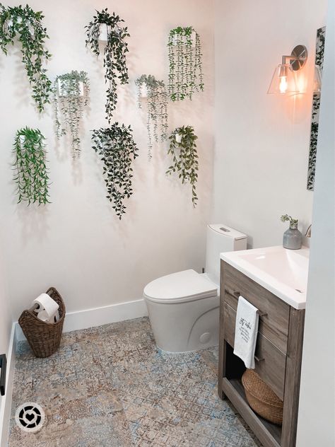 Plant Decor Bathroom Ideas, Half Pots On Wall, Bath Plants Decor, Large Half Bathroom Decor, Fake Greenery Wall Bathroom, Bathroom Wall Plant Decor, Small Wall Mirror Decor Ideas, Half Bath With Accent Wall, Faux Greenery Wall Bathroom