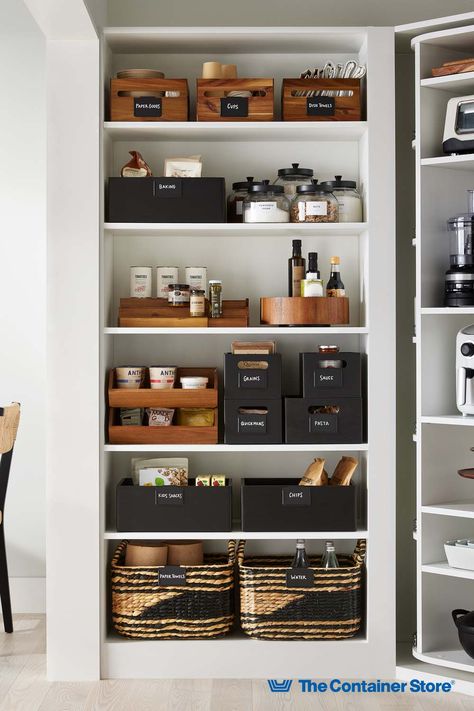 From sustainably-made shelf organizers and bins to food canisters and labels, The Container Store has everything you need to keep your kitchen organized! Shop our collection here! Pantry Bottle Organization, Tea Pantry Organization, Container Store Pantry Organization, High End Pantry Organization, Pantry Storage Bins, Dinnerware Organization Cabinets, Black And Wood Pantry Organization, Gold Pantry Organization, The Container Store Ideas