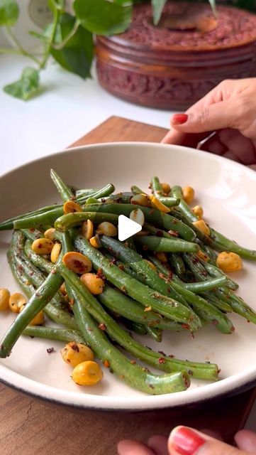 Adhya S on Instagram: "Beans & peanut stir-fry ✨  220cal | 11g protein | 13g fat | 15g carb | 8g fibre  Recipe ✨  250g green beans  25g roasted peanuts  1 tsp red chilli flakes  6-7 garlic coves minced  1.5tsp oil  1/2tsp soya sauce for that umami ( optional )   To cook the beans perfectly, first sauté on high heat, then add water to it. Once it starts to sizzle, cover and cook for 3-4mins.   Now add other seasons and peanuts. Stir-fry for 2-3 mins and serve after 5-10mins.   #stirfry #healthyrecipes #healthyindianfood #homechef #homecookedfood #recipes" Soya Bean Recipes, Box Recipes, Healthy Indian Recipes, Soya Bean, Soya Sauce, Fiber Foods, Chilli Flakes, Lunch Box Recipes, Roasted Peanuts