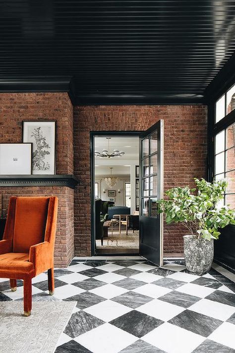 Black Sunroom, Brick Sunroom, Harlequin Floors, Jean Stoffer Design, Checkered Floor, Red Brick Wall, Brick Interior, Black And White Tiles, Black Ceiling