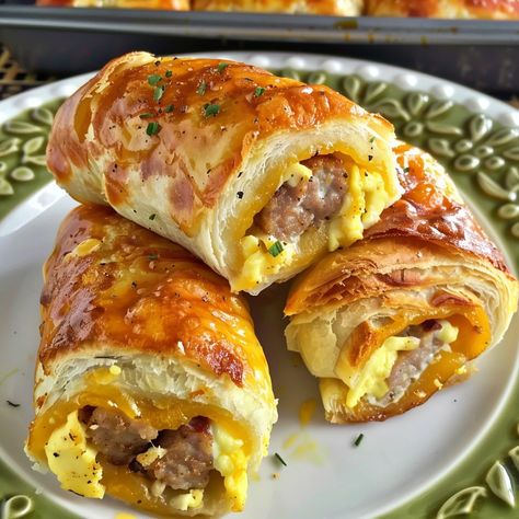 Breakfast roll-ups are a delightful and convenient option for those busy mornings when time is of the essence. Typically combining savory ingredients like sausage, egg, and cheese wrapped in a ... Read more Hearty Snack Ideas, Breakfast Roll, Breakfast Sausage Links, Cheese Breakfast, Breakfast Rolls, Egg And Cheese, Classic Breakfast, Sausage And Egg, Breakfast Recipes Casserole