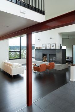 Exposed steel column and beam in living room - modern - Living Room - Seattle - CAST architecture OPEN FEEL, SIMPLE MATERIALS, FLOORING, EXPOSED STEEL BEAM AND COLUMN, LARGE WINDOWS TO MAXIMIZE VIEW, WINDOWS WITH STEEL FRAMES Beam In Living Room, Columns In Living Room, Beams Living Room, Warehouse Living, Metal Beam, Steel Frame House, Steel Columns, Steel Beams, Metal Building Homes