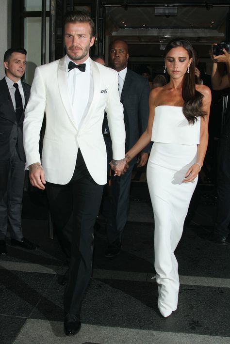 Victoria and David Beckham Are a Picture-Perfect Met Gala Couple: Victoria Beckham had her husband, David Beckham, by her side when she arrived at the 2014 Met Gala in NYC on Monday, and they even shared a kiss on the red carpet. White Tux, Victoria And David, Wedding Tux, Dressed In White, David And Victoria Beckham, Groom Wedding Attire, Wedding Suits Groom, Groom Tuxedo, White Tuxedo