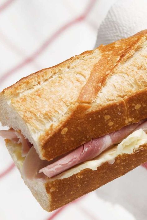 French sandwiches are a thing of glory. Here are 8 classic combinations with baguettes, butter and more to eat the next time you're in France. French Croissant Sandwiches, French Loaf Sandwich Ideas, Toasted Baguette Sandwich, Recipes Using French Baguette, Baguette Sandwiches Ideas, Uses For Baguette, French Baguette Breakfast Ideas, Baquette Bread Sandwich, Baguette Sandwich Aesthetic