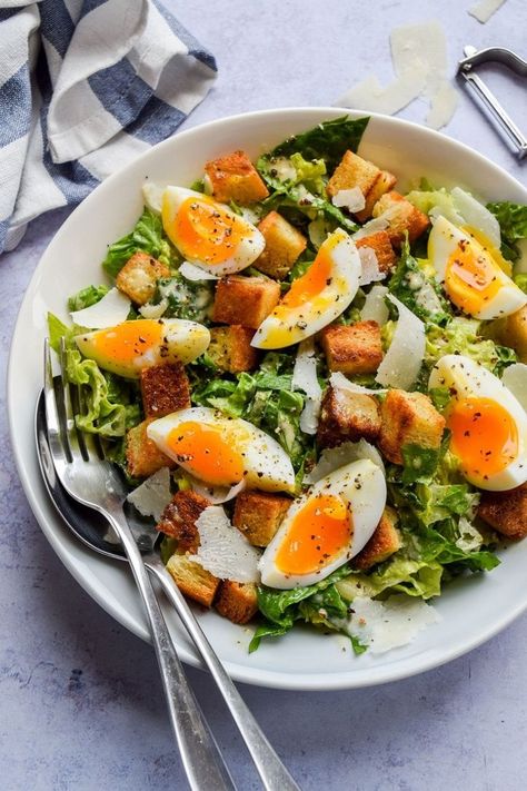 A super easy caesar salad (with no raw eggs) is made with a classic tangy dressing, parmesan shavings, soft boiled eggs and croutons made out of leftover stale bread. Crouton Recipes, Roasted Red Pepper Soup, Tomato Salad Recipes, Seasonal Salad, Leftover Bread, Stale Bread, Soft Boiled Eggs, Summer Salad Recipes, Stuffed Pepper Soup