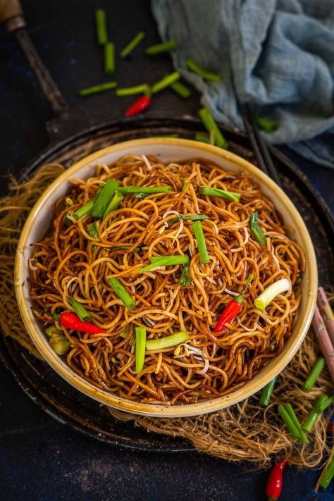 These crispy Cantonese Style Pan Fried Noodles are packed with flavors and come together in under 20 minutes. Make this favorite Asian restaurant version at home using my easy recipe. Chilli Garlic Noodles, Fried Noodles Recipe, Pan Fried Noodles, Crispy Noodles, Authentic Asian Recipes, Asian Restaurant, Brunch Spread, Fried Noodles, Chicken Thigh Recipes Crockpot