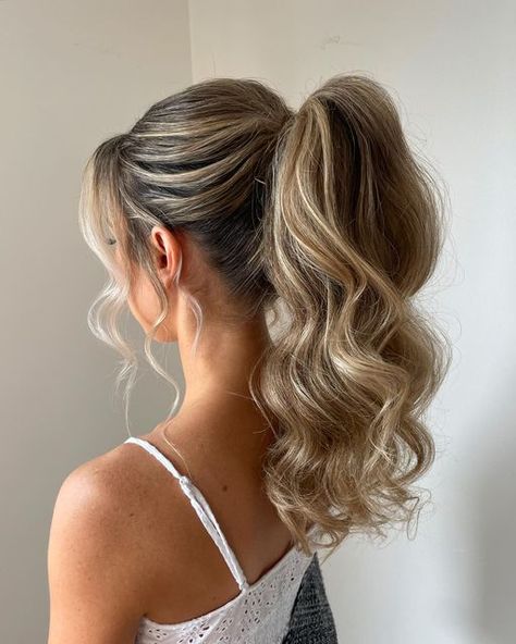 RACHEL JONES | Calgary Bridal Hair & Educator on Instagram: "POWER PONY 2024 INSPO 🫶🏻  This was a Big request last season not only for bridesmaids but also other stylists!   Truly one of my favorite styles to create for a gorgeous summer wedding   We were able to add lots of height AND a veil 😍  A fundamental with this styles is overall teasing… and I’m not necessarily referring to the pony 🫣  The W H O L E head will have texture, product and volume->   So it W I L L last all night long 🙌🏻  Would you wear this style to a wedding?" Bridesmaid Power Pony, Bridal Long Ponytail, Bride Hairstyles Updo Ponytail, Ponytail Bridal Hair With Veil, Slick Back Pony Wedding Hair, Pony Hairstyles For Medium Hair, Wedding Hairstyles Updo Ponytail, Bridesmaid Party Pony, Wedding Hair Low Pony