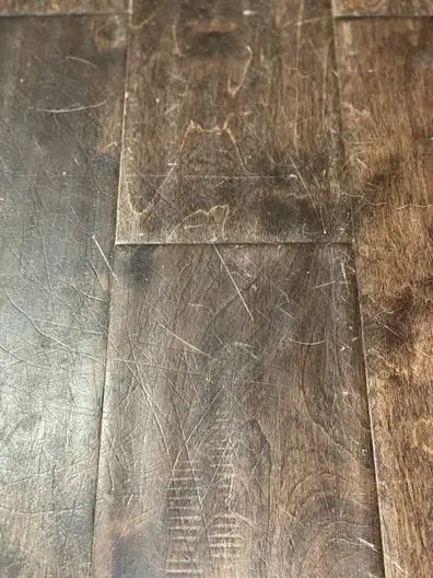 How To Remove Scratches From Hardwood Floors, How To Fix Scratches On Hardwood Floors, Fix Scratched Wood Floors, Scratches On Wood Floor, Dark Brown Hardwood Floors, Hardwood Floor Scratches, Scratched Wood Floors, Fake Wood Flooring, Dark Brown Wood Floors