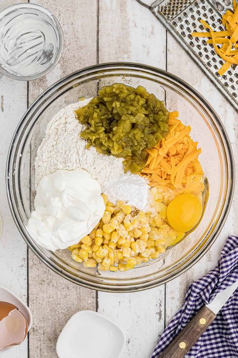 This Cheesy Green Chile Cornbread takes everyday cornbread to the next level with sharp Cheddar cheese, and roasted green chiles! https://www.lanascooking.com/cheesy-green-chile-cornbread/ Cornbread With Chilis And Cheese, Cornbread Recipe With Green Chilis, Cornbread With Cheese And Corn, Jiffy Cornbread Recipes Green Chili, Chili Relent Cornbread, Green Chili Cheese Corn Spoon Bread, Green Chile Cheese Cornbread, Chiles Rellenos Cornbread Recipe, Green Chili Cornbread Muffins