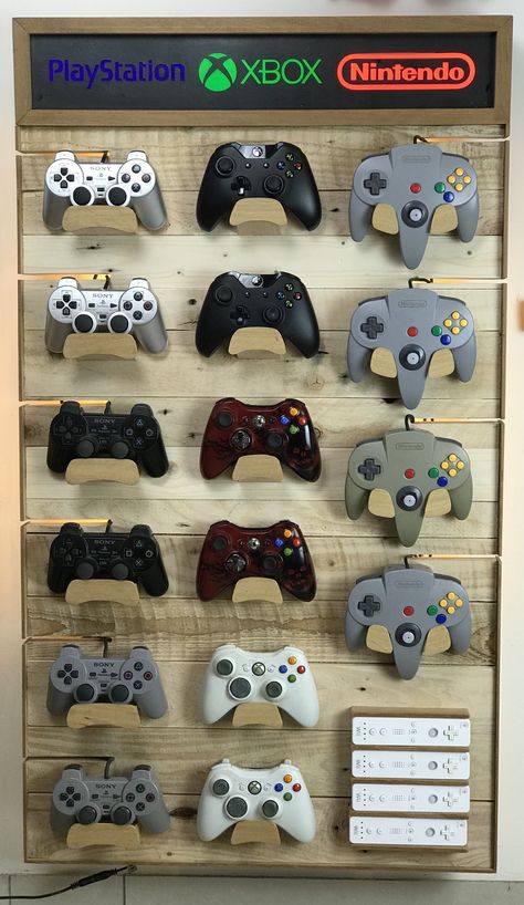 Video Game Controller Rack : We designed and built this rack for all of our games consoles, old and new! #organisation Wood Xbox Controller Stand, Gaming Controller Organization, Game Controller Organization, Console Display Ideas, Game Controller Stand, Video Game Controller Storage, Old Gaming Consoles, Multiple Game Console Setup, Diy Controller Stand