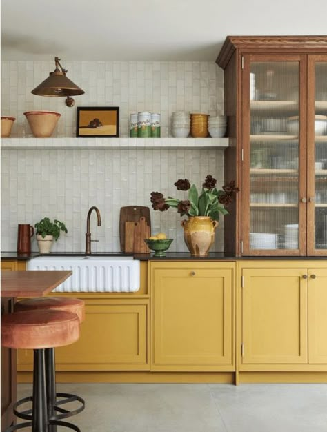 12 Paint Color & Interior Design Trends for 2024 - Amykranecolor.com Dark Yellow Kitchen Cabinets, Small Bold Kitchen, Devol Scullery Yellow, Mustard Color Kitchen Cabinets, Marigold Kitchen Cabinets, Peach Cabinets Kitchens, Kitchen Yellow Cabinets, Ochre Kitchen Cabinets, Color Drenched Kitchen