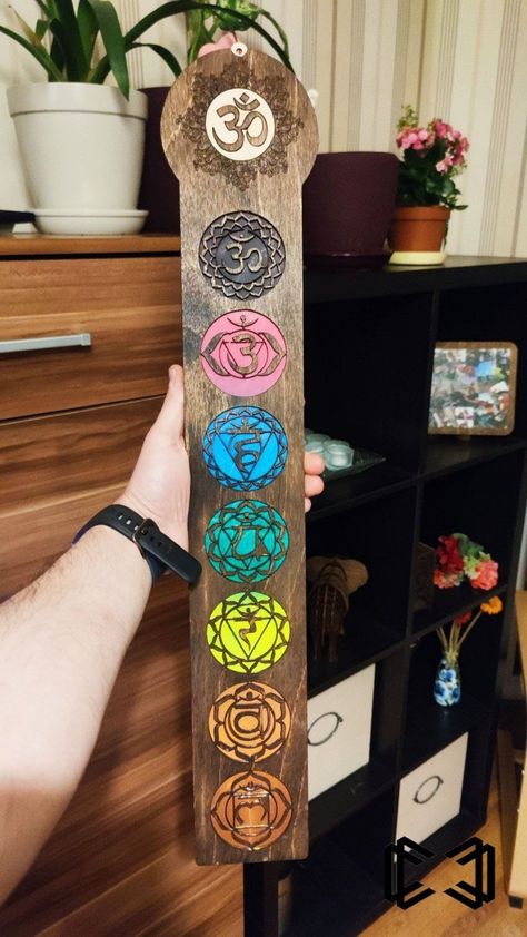 Wooden art cut out in line showing the seven chakras. Chakras Symbols, Layered Wood Art, Chakra Wall Art, Leaves Wallpaper Iphone, Yoga Room Decor, Meditation Decor, Chakra Symbols, Seven Chakra, Buddha Meditation