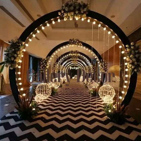 Captivating Wedding Arch Flowers to Wow Your Guests Mangalore Style Wedding, Great Gatsby Wedding Backdrop, Event Pathway Ideas, Light Entrance Wedding, Sangeet Walkway Decor, Sangeet Entry Decor, Sangeet Pathway Decor, Cocktail Party Decorations Elegant, Sangeet Decoration Stage Outdoor