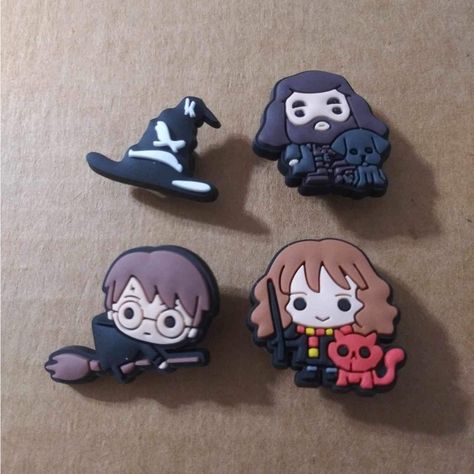 This Order Comes With One Harry Potter, One Hermione Granger, One Hagrid, And One Sorting Hat Charm! Check Out My Closet For More Charms! Bundle To Save $$! Message Me For A Custom Order! Tags: Clog Charms, Shoe Charms, Jibbitz, Jibbits, Bundle, Stocking Stuffers Miffy Cute, Croc Pins, Harry Potter Shoes, Croc Jibbitz, Harry Potter Outfits, Sorting Hat, Women's Crocs, Croc Charms, Hermione Granger