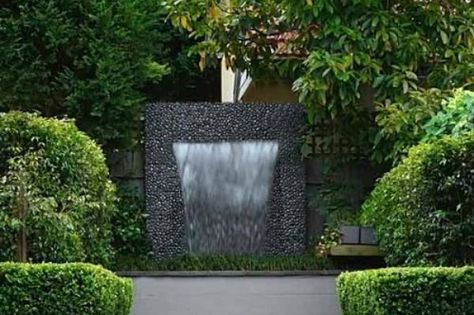 The hottest water features for your garden Terrace Water Feature, Modern Wall Waterfall Outdoor, Modern Water Feature Entrance Home, Commercial Water Feature, Sculptural Water Feature, Waterfall Landscaping, Contemporary Water Feature, Water Feature Wall, Outdoor Water Features