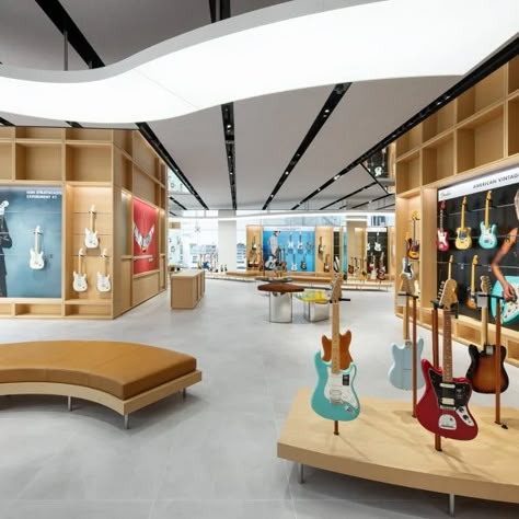 Music Shop Design, Music Store Interior, Glass Display Unit, Yas Island Abu Dhabi, Led Display Board, Dubai Interior Design, Wooden Facade, Interior Architecture Drawing, Electric Guitar Design