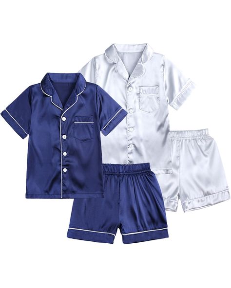 PRICES MAY VARY. Material: Made from high-quality silk satin, these pajamas are gentle on delicate skin, promising a soft and comfortable sleep and lounge experience—perfect for sensitive skin Feature: Boys girls silk pajamas set, soft and silky short sleeve tops with single-breasted closure, one front pocket, turn-down collar, matching elastic waistband shorts Design: Our pajama set is designed for both boys and girls, featuring a classic and versatile style suitable for all toddlers, provide b Pajama Set For Kids, Friday Costume, Shorts Design, Satin Nightwear, Boys Sleepwear, Kids Nightwear, Satin Pajama, Silk Button Up, Xmas List