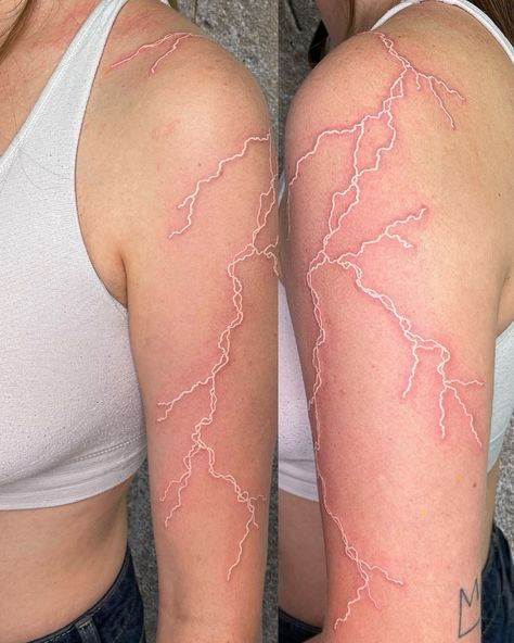 Lightning Shoulder Tattoos For Women, White Ink Cloud Tattoo, White Lightening Tattoos, White Ink Lightning Tattoo Hand, White Tattoo Lightning, White Lighting Tattoo, Freedom Tattoo For Women Inspiration, Lightning Arm Tattoo, White Ink Lightning Tattoo