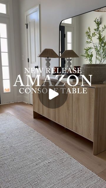 Jeanne Zamith | Organic & Neutral Home Decor on Instagram: "‼️JUST RELEASED‼️

This new ✨beauty✨ of a fluted console table is from Amazon & is under $300!! The wood tone is so so pretty. Would be great as a buffet, tv stand, or coffee bar too!! 

Push to open & there’s shelving for storage 😍

Comment “CONSOLE” & I’ll send a link to this console table & everything I used to style it!! 🤎" Under Tv Table, Console Under Tv, Tv Console Styling, Fluted Console Table, Under Tv Decor, Fluted Console, Buffet Tv Stand, Shelving For Storage, Buffet Tv