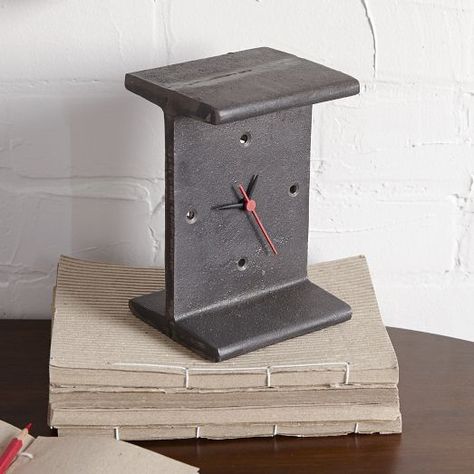 The minimalistic design, steel frame and matte finish of the I-Beam Clock lends an industrial vibe to desks, bookcases or consoles. Futurist Architecture, Handy Craft, Wooden Work, Rustic Clock, Industrial Design Furniture, Bar Designs, Vintage Industrial Furniture, Industrial Interiors, Industrial Pipe