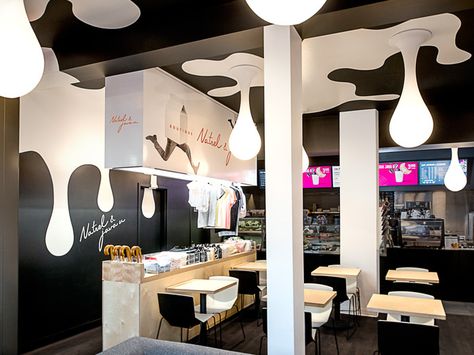 As part of a repositioning plan begun in 2014, Natrel has completed another key step in its brand redeployment. It seized the opportunity to engage more closely with its customers by reaching them at their daily stop: Montreal cafés! | by lg2 boutique Chocolate Store Design, Carnicerias Ideas, Milk Store, Milk Cafe, Chocolate Stores, 광고 디자인, 카페 인테리어 디자인, Milk Shop, Milk Bar