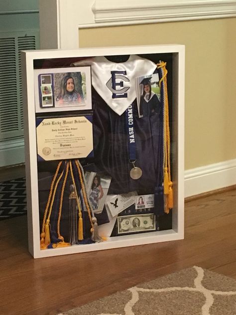 Cap And Gown Storage Ideas, Graduation Box Frame, How To Store Graduation Cap And Gown, Senior Year Shadow Box Ideas, Grad Keepsake Ideas, Remembrance Shadow Box Ideas, Grad Cap Display, Graduation Craft Ideas High School, Graduation Room Decor