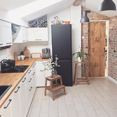 Image may contain: indoor Black Fridge, Black Fridges, Interior Boho, Scandinavian Style Home, Fridge Decor, Kitchen Plans, 인테리어 디자인, White Kitchen, A Kitchen