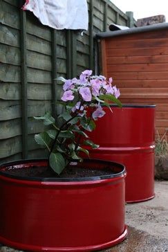 Barrel Planter (with Pictures) - Instructables Barrel Garden Planters, Planter Box Diy, Planter Box Ideas, Diy Design Ideas, Brick Planter, Garden Planter Ideas, Metal Building Kits, Barrel Projects, Vegetable Planters