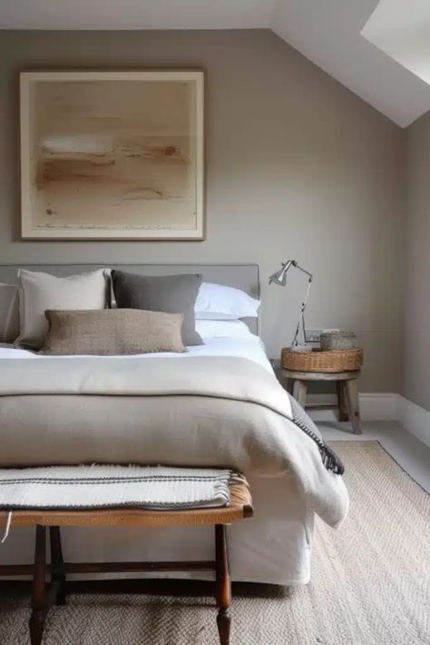 Are you tired of high-intensity hues and craving a more relaxed tone for your bedroom? Opting for a color palette combining beige and grey could be the solution you need. Here, we’ve curated 25 chic beige and grey bedroom ideas that exploit these tones' full potential, creating beautifully balanced interiors that exude tranquility and elegance. Beige Walls Grey Furniture, Warm Grey Bedroom, Greige Bedroom Ideas, Cream And Grey Bedroom, Beige And Grey Bedroom, Greige Bedroom, Tan Bedding, Tan Bedroom, Grey Bedroom Ideas