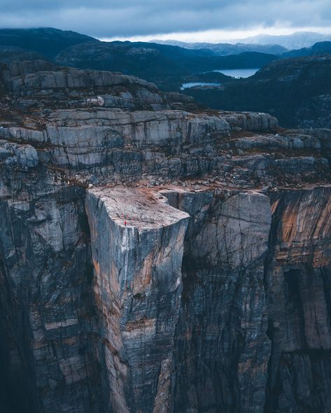 Preikestolen (Pulpit Rock) is one of the most spectacular places to visit in Norway. It is a cliff that rises 604 meters above Lysefjorden, with an almost flat top of approximately 25 by 25 meters. During the main summer season, it can get pretty crowded. To avoid the crowds, consider traveling during the offseason or hiking up early in the morning or late in the evening. This might give you a chance to have the place all to yourself. 🇳🇴 Places to Visit in Norway | The Pulpit Rock - Preikest... Norway Summer, Early In The Morning, Summer Season, In The Morning, The Morning, Places To See, Norway, Maine, Places To Visit