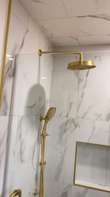 Vogt • Kitchen & Bath Fixtures on Instagram: "Dripping in Gold. Bathroom remodel by @newellsquality Featured Collection: Zehn Featured Finish: Brushed Gold #Vogt #Bathroom #BathroomRenovation #Bathroom #Shower #ShowerDesign #ShowerRenovation" Gold Bathroom Shower Fixtures, Brushed Gold Shower Fixtures, Gold Accent Bathroom, Bathroom Gold Fixtures, Brushed Gold Bathroom Fixtures, Black White And Gold Bathroom, Gold Shower Fixtures, Condo Room, Gold Bathroom Fixtures