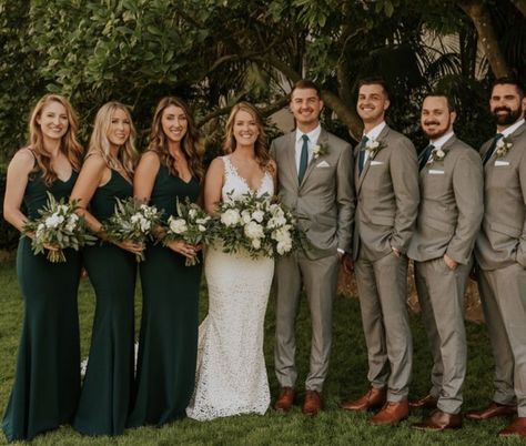 Grey And Green Tux Wedding, Dusty Green Bridesmaid Dresses With Groomsmen, Groomsmen Emerald Green Attire, Grey Tux With Emerald Green, Emerald Green And Taupe Wedding, Forest Green Wedding Bridal Party, Green Tie Wedding Groomsmen, Boho Wedding Emerald Green, Evergreen Bridesmaid Dresses With Groomsmen