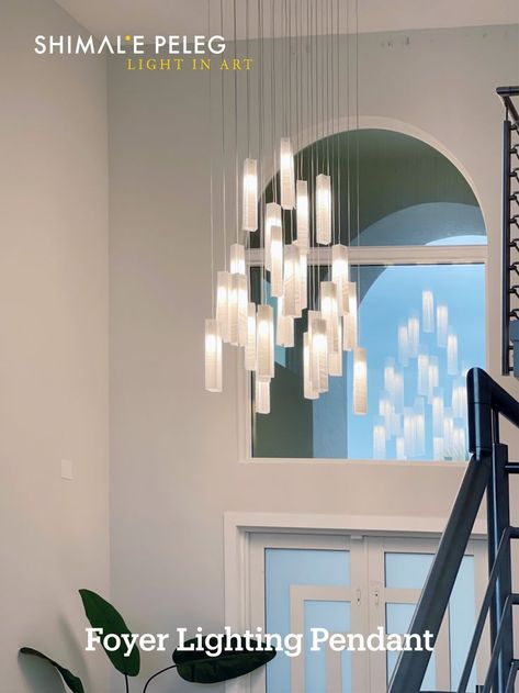 Modern chandelier for high ceiling space such as high ceiling foyer, two-story entryway or stairway. These hanging pendant lighting can be designed to fit even 30ft ceiling and more. The linear glass pendants are made to order to perfectly fit your space and spread glowing warm light in space #foyerlighting #entryway #interiorlighting #chandelierlighting #stainedglass #Artglass #Customlighting Chandelier For High Ceiling, Chandelier For Entryway, High Ceiling Foyer, Foyer Lights, Entry Chandelier, Modern Foyer, Entryway Chandelier, Chandelier Lighting Modern, Modern Farmhouse Lighting