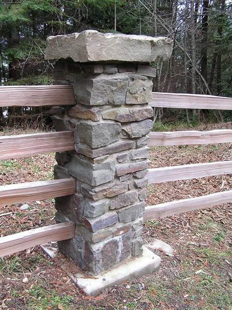 This stone column is part of a split rail fence that travels along the property line. Share Tweet + 1 Mail Build Fence, Fence Door, Split Rail Fence, Stone Fence, Fence Planters, Cheap Fence, Driveway Entrance, Brick Fence, Front Yard Fence