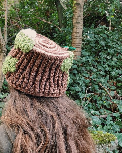 You could be normal, or you could make yourself an entire mini-ecosystem and wear it on your head. Crochet a Forest Spirit Bucket Hat with this pattern and become the unhinged bog witch of your dreams. People will not be able to stop staring at your mossy tree stump of a hat, you have been warned! Read more on our blog! Pattern level: Intermediate. This pattern uses a lot of intermediate techniques, some stitches I made up, and a LOT of creative thinking with placement. It's definitely not for b Crochet Modern Witch Hat, Crochet Fly Bonnet Pattern Free, Crochet Hiking Gear, Crochet Tree Hat, 1 Yarn Crochet Patterns, Camo Crochet Hat, The Hobbit Crochet Patterns, Scarf Hat Crochet, Crochet Hat Brim Pattern Free