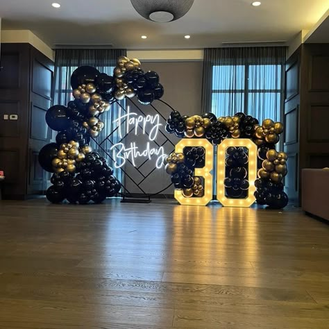 Black/Gold Balloon garland with a 30 Marquee sign 30th Birthday Balloons Decoration Men, Black And Gold 50th Birthday Backdrop, 75th Birthday Centerpieces Ideas For Men, 30th Birthday Parties Men, Decoration For Men's Birthday, 35th Birthday Backdrop Ideas, 30th Birthday Backdrop For Men, Men Black And Gold Party Ideas, Gold And Black Balloons Decoration