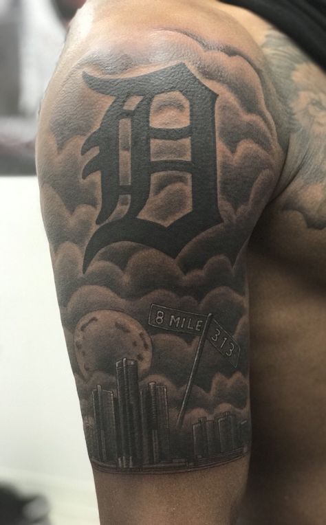 Detroit Tattoos For Men, Hood Arm Tattoos Men, Hood Arm Tattoos, Upper Arm Tattoo Men Ideas, City Tattoo Ideas For Men Sleeve, Detroit Tattoo Ideas, Upper Shoulder Tattoo Men Half Sleeves, New York Forearm Tattoo, Michigan Tattoo