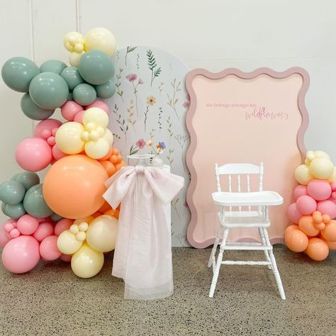 PERTH’S PREMIUM PROP AND EVENT HIRE on Instagram: "🌸She belongs amongst the wildflowers🌸  The sweetest theme for a first birthday, celebrating Navy’s First Bloom 🌸  #blanconbriggs #events #eventsperth #eventsstyling #eventstyling #perthevents #pertheventsupplier #perthparties #perthparty #eventlife #eventsprofs #eventhire #pertheventhire #pertheventstylist #pertheventstylists #perthpartykids #perthkidspartyhire #firstbloom #wildflowertheme #wildflowerpartydecor #balloongarland #balloonsdecor #ballooninstallation" First Birthday Backdrop Ideas, Kids Party Hire, Baby Shower Gender Reveal Cake, Kids Table Set, Pretty Balloons, Flower Birthday Party, Fairy Garden Birthday Party, Baby Birthday Decorations, Fall Birthday Parties