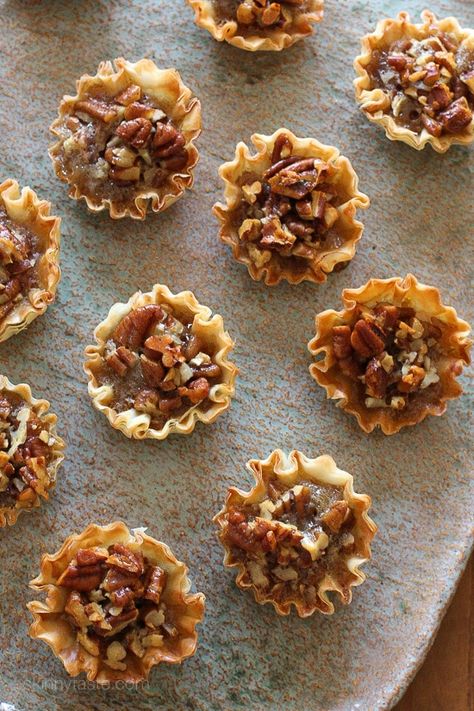 These bite sized pecan tarts are the perfect lighter alternative for pecan pie this holiday season! They are so easy to make, just 7 ingredients for a delicious treat. Pecan Tarts Mini, Phyllo Bites, Pecan Tarts Recipe, House Trends, Savory Pumpkin, Cozy Romantic, Phyllo Cups, Pecan Tarts, Pie Filling Recipes