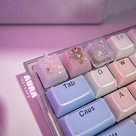 ~♡ These resin keycaps are all handmade by Aura Keycaps ♡~  Add a touch of dreaminess, cutesy, and elegance to your mechanical keyboard and computer room setup with our artisan keycaps! Our clicky keychain lets you turn your keycap into the perfect fidget buddy, and you can have a cute keycap without owning a mechanical keyboard ♡ Each keycap is uniquely handmade with love, so please note that there may be minor differences than shown in photos and slight imperfections. All keycaps are topped off with a gloss resin coat to preserve from wear and tear.  ~♡ Sizing ♡~ These keycaps are compatible with most MX switches (e.g., Cherry MX, Gateron, Halo, Kaihua) or any switches with a cross-shaped shaft . The keycaps are modelled among Cherry profile keycaps.  ~♡ Processing times ♡~ As each keyca Artisan Keycaps Resin, Cute Keycaps Aesthetic, Computer Room Setup, Cute Key Caps, Jelly Keycaps, Cute Keyboards, Resin Keycaps, Custom Keyboard, Custom Keycaps