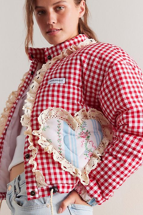 Find A/ASUNSOLO Gingham Heart Jacket on Editorialist. Wear your heart on your jacket with this stunning design from A/ASUNSOLO, featured in a puffer style and fun gingham print, complete with heart-shaped pockets and teddy trim throughout. **Fit:** Hip length, puffy **Features:** Cotton fabrication, stand collar, gingham print, snap closure, teddy trim, heart-shaped pockets, drawstring hem, flannel lining, lace detailing **Why We A/ASUNSOLO Gingham Heart Jacket in Black, Size: XS Upcycling, Fun Winter Jackets, Puff Quilt Jacket, Red Gingham Outfit, Rainbow Academia, Heart Jacket, Ropa Upcycling, Shag Jacket, Lizzie Hearts