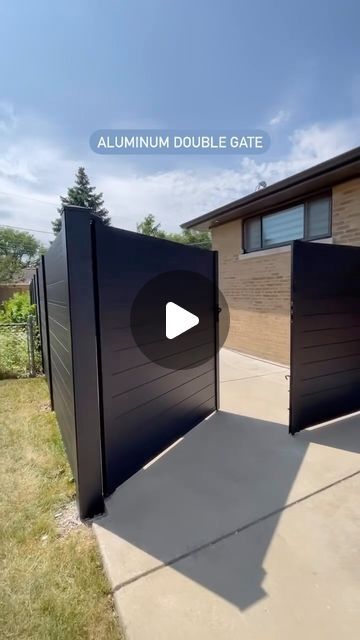 Greenwood Fence™ | Composite + Aluminum on Instagram: "Smooth + good looking, tell your contractor you need a Greenwood Fence aluminum double gate.👇🏼 Do you like this style fence? Comment below. 📍Greenwood Fence HQ — Elmhurst, IL 🛠️: USA only shipping 🎥: @modern_fence_chicago #GreenwoodFence #compositefence #modernfence #privacyfence #DIYfence #aluminum [local fence builder, old post removal, concrete posts, backyard decor, luxury backyard, composite fencing, composite materials, gates, custom gates, aluminum gates, double door gate, wood plastic composite, fencing, fence build, custom fences, home improvement, luxury home ideas]" Fence Front Yard Ideas, Composite Gate Ideas, Aluminum Gates Design, Gate Doors Ideas Fence, Gate Fence Ideas, Front Gate Design Front Gate Design Modern, Double Gate Fence, Fences And Gates Modern, Composite Fence Ideas