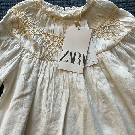 Nwt Zara Girls Size 18-24m Embroidered Long Sleeve Fully Lined Cream Colored Top Button Back Closure Embroidered Along The Front And Back And Sleeve Cuff Romantic Lace Blouse, Puff Sleeves Top, Light Pink Shirt, Black Lace Tank Top, Kids Light, Bodysuit Blouse, Zara Girl, Gingham Tops, Zara Shirt