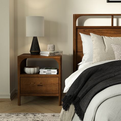 The Cali bed is crafted from solid oak wood and oak veneers. The wood is hand finished with a walnut stain, which adds a warm and rich tone to the piece, and enhances the natural grain patterns of the oak. The bed features a subtle arch detail that ties it into the rest of the bedroom collection. Wooden slats are included so it can be used without a box spring for low, modern feel. Solid Wooden Bed, Importance Of Rest, Copper Top Table, Oak Bed, Oak Nightstand, Walnut Nightstand, Oak Beds, Wooden Bed Design, Outdoor Accent Table