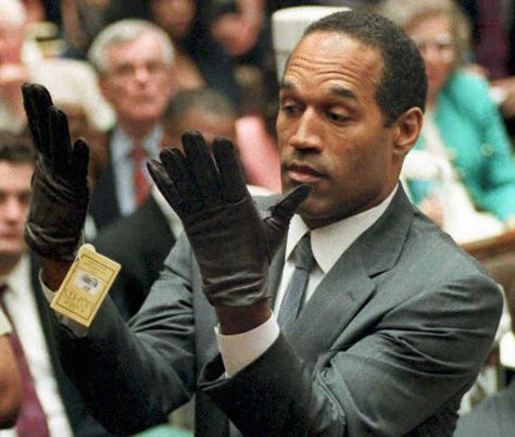 June 1995 — O.J. Simpson trials | The 50 Most Powerful Pictures In American History.  "If the gloves don't fit, you must equit." O J Simpson, Oj Simpson, Powerful Pictures, Armed Robbery, Iconic Photos, Ex Wives, News Website, American Horror Story, Barack Obama